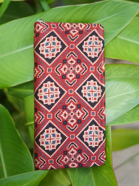 red and blue handmade cloth wallet