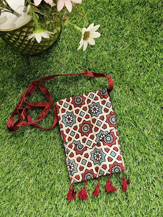 beige sling bag