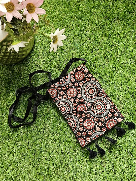 black & blue circles sling bag