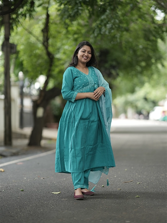 blue and green churidar set