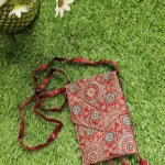 red blue circles sling bag