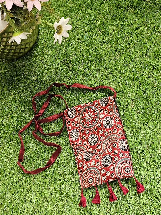 red blue circles sling bag