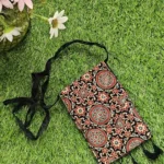 red star print sling bag