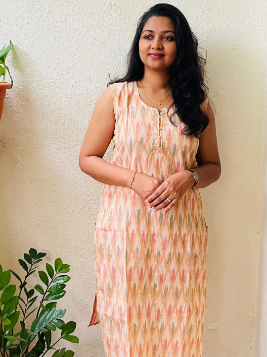 orange long sleeveless kurti